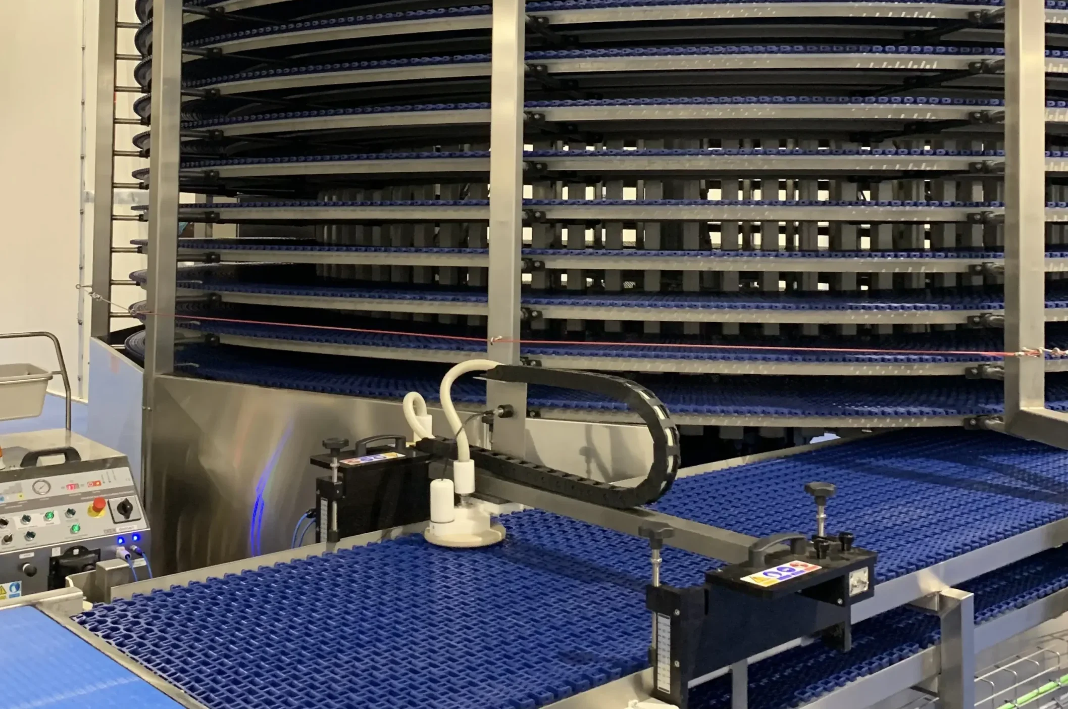 Automated CIP for Spiral Belts: Clean Existing Coolers and Freezers Without Modification